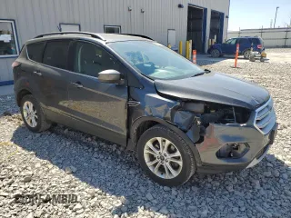 2018 Ford Escape SE z VIN 1FMCU9GD0JUA95941, wystawiony jako Copart lot #56606625 z przebiegiem 137 924 mil mil oraz Nie do naprawy • Non repairable. Historia ofert i sprzedaży dostępna na DreamBid. Obrazek 4.