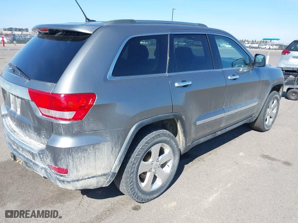 2013 Jeep Grand Cherokee Limited with VIN 1C4RJFBG1DC616179, listed as a IAAI auction lot 41853911 with 138,800 mi miles. Bid and sale history available at carsss.com. Image 4.