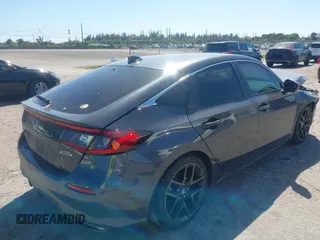 2023 Honda Civic Sport Touring z VIN 19XFL1H80PE017819, wystawiony jako IAAI lot #41833813 z przebiegiem 26 279 mil mil oraz . Historia ofert i sprzedaży dostępna na DreamBid. Obrazek 4.