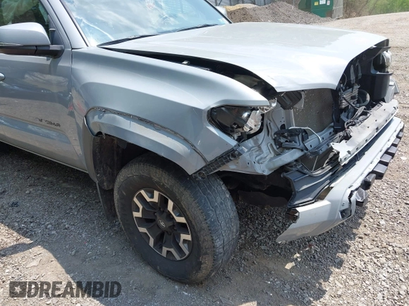 2020 Toyota Tacoma SR5 with VIN 3TMCZ5AN7LM341505, listed as a IAAI auction lot 42430647 with 73,285 mi miles and . Bid and sale history available at DreamBid. Image 6.
