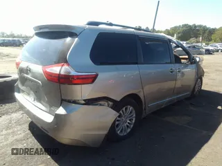 2015 Toyota Sienna XLE with VIN 5TDYK3DC1FS657933, listed as a IAAI auction lot 34212306 with 107,281 mi miles. Bid and sale history available at carsss.com. Image 4.