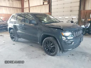 2017 Jeep Grand Cherokee Laredo with VIN 1C4RJFAG2HC786171, listed as a IAAI auction lot 40746519 with 166,136 mi miles. Bid and sale history available at carsss.com. Image 1.