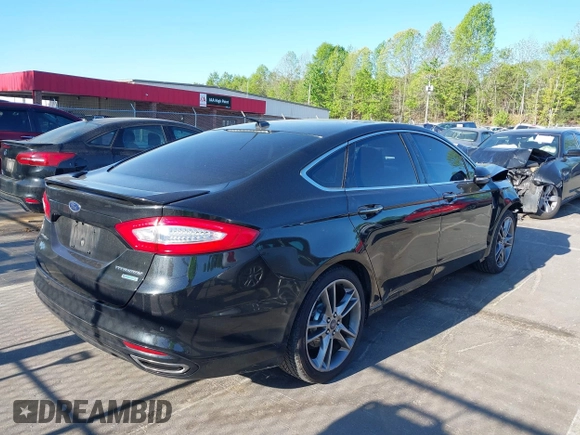 2013 Ford Fusion Titanium with VIN 3FA6P0K99DR374510, listed as a IAAI auction lot 42050026 with 133,227 mi miles and . Bid and sale history available at DreamBid. Image 4.