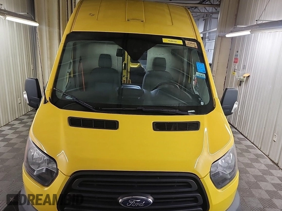 2019 Ford Transit z VIN 1FTYR3XM7KKA24824, wystawiony jako IAAI lot #42500762 z przebiegiem 75 307 mil mil oraz . Historia ofert i sprzedaży dostępna na DreamBid. Obrazek 6.