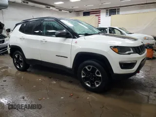 2018 Jeep Compass Trailhawk with VIN 3C4NJDDBXJT255622, listed as a Copart auction lot 85917244 with 73,388 mi miles and Clean Title. Bid and sale history available at carsss.com. Image 4.