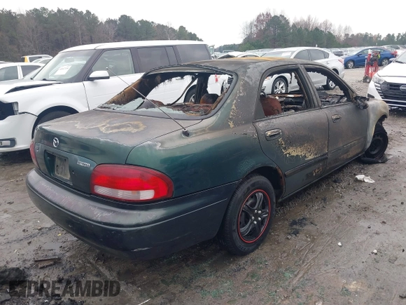 1999 Mazda 626 ES z VIN 1YVGF22C1X5840702, wystawiony jako IAAI lot #41047339 z przebiegiem Nie podano mil oraz . Historia ofert i sprzedaży dostępna na DreamBid. Obrazek 4.