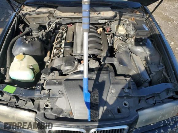 1997 BMW 3 Series 328is with VIN WBABG1323VET04177, listed as a Copart auction lot 44462755 with 166,108 mi miles and Clean Title. Bid and sale history available at carsss.com. Image 11.
