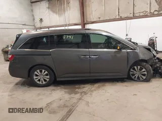 2011 Honda Odyssey Touring Elite with VIN 5FNRL5H96BB030946, listed as a IAAI auction lot 41465741 with 122,678 mi miles and . Bid and sale history available at DreamBid. Image 13.