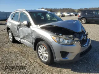 2014 Mazda CX-5 Sport with VIN JM3KE2BE1E0350718, listed as a Copart auction lot 46370205 with 98,065 mi miles and Salvage title. Bid and sale history available at DreamBid. Image 4.