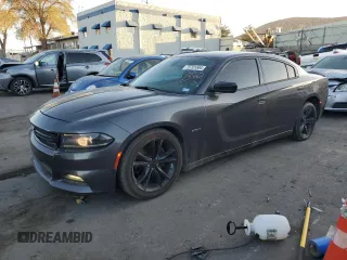 2016 Dodge Charger R/T with VIN 2C3CDXCT1GH283471, listed as a Copart auction lot 75701504 with 127,151 mi miles and Salvage title. Bid and sale history available at DreamBid. Image 1.