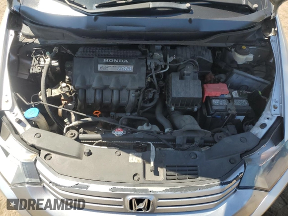 2010 Honda Insight EX with VIN JHMZE2H79AS023173, listed as a Copart auction lot 58087275 with 216,322 mi miles and Salvage title. Bid and sale history available at DreamBid. Image 11.