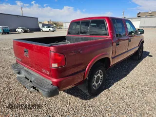 2001 GMC Sonoma SLS with VIN 1GTDT13W81K235525, listed as a Copart auction lot 48604095 with 104,581 mi miles and Clean Title. Bid and sale history available at DreamBid. Image 4.