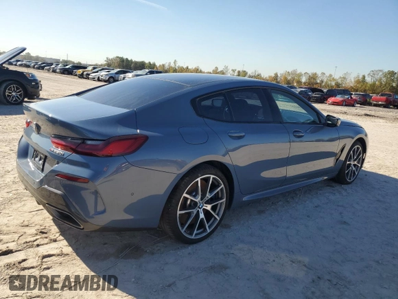 2022 BMW 8 Series M850i z VIN WBAGV8C08NCK07510, wystawiony jako Copart lot #84925344 z przebiegiem 16 955 mil mil oraz Szkody całkowita. Historia ofert i sprzedaży dostępna na DreamBid. Obrazek 3.