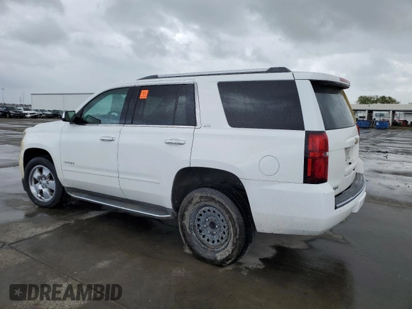 2016 Chevrolet Tahoe LTZ with VIN 1GNSCCKC4GR223339, listed as a Copart auction lot 51135015 with 150,853 mi miles and Salvage title. Bid and sale history available at DreamBid. Image 2.