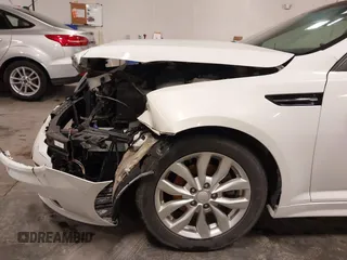 2015 Kia Optima EX z VIN 5XXGN4A7XFG502833, wystawiony jako IAAI lot #42193532 z przebiegiem 180 272 mil mil oraz . Historia ofert i sprzedaży dostępna na DreamBid. Obrazek 18.