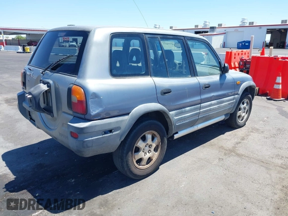 1996 Toyota RAV4 with VIN JT3GP10V2T7004322, listed as a IAAI auction lot 42774371 with 167,868 mi miles and . Bid and sale history available at DreamBid. Image 4.
