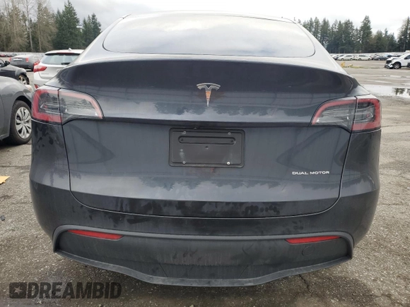 2025 Tesla Model Y Long Range with VIN 7SAYGDEE5SF296652, listed as a Copart auction lot 46664465 with 452 mi miles and Salvage Title. Bid and sale history available at DreamBid. Image 6.