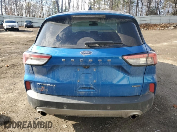 2021 Ford Escape Titanium Hybrid z VIN 1FMCU9DZ9MUA18764, wystawiony jako Copart lot #78848764 z przebiegiem 89 499 mil mil oraz Nie do naprawy • Non repairable. Historia ofert i sprzedaży dostępna na DreamBid. Obrazek 6.