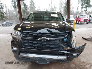 2022 Chevrolet Colorado 4WD Z71 z VIN 1GCGTDEN7N1244585, wystawiony jako IAAI lot #41625980 z przebiegiem 21 210 mil mil oraz . Historia ofert i sprzedaży dostępna na DreamBid. Obrazek 12.