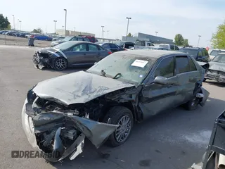 2004 Cadillac DeVille DHS z VIN 1G6KE57Y74U119605, wystawiony jako IAAI lot #40555057 z przebiegiem Nie podano mil oraz . Historia ofert i sprzedaży dostępna na DreamBid. Obrazek 17.