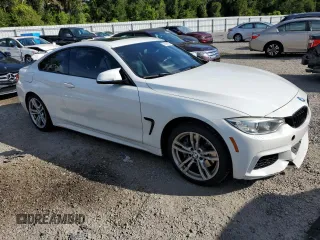 2014 BMW 4 Series 435i xDrive with VIN WBA3R5C59EK187836, listed as a Copart auction lot 63946075 with 100,700 mi miles and Salvage title. Bid and sale history available at DreamBid. Image 4.