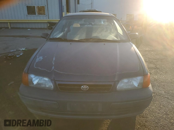 1996 Toyota Tercel DX z VIN JT2AC52L5T0190097, wystawiony jako Copart lot #76574844 z przebiegiem 175 256 mil mil oraz Tytuł czysty. Historia ofert i sprzedaży dostępna na DreamBid. Obrazek 5.