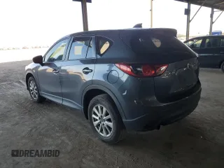 2013 Mazda CX-5 Sport with VIN JM3KE2BE0D0144630, listed as a Copart auction lot 64690215 with 155,155 mi miles and Clean title. Bid and sale history available at DreamBid. Image 2.