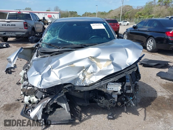 2021 Honda Civic Sport with VIN SHHFK7H43MU225961, listed as a IAAI auction lot 41721936 with 58,928 mi miles and . Bid and sale history available at DreamBid. Image 12.