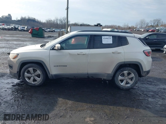 2019 Jeep Compass Latitude with VIN 3C4NJDBB7KT703593, listed as a IAAI auction lot 41490224 with 99,640 mi miles. Bid and sale history available at carsss.com. Image 14.