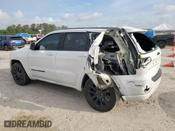 2018 Jeep Grand Cherokee Altitude with VIN 1C4RJEAG1JC397392, listed as a Copart auction lot 58214815 with 118,390 mi miles and Salvage title. Bid and sale history available at DreamBid. Image 2.