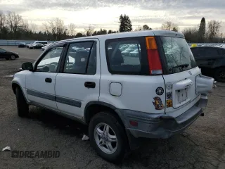 2000 Honda CR-V LX with VIN JHLRD1842YS005843, listed as a Copart auction lot 51677025 with 294,710 mi miles and Salvage Title. Bid and sale history available at carsss.com. Image 2.