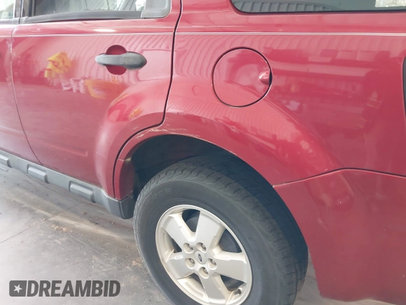 2008 Ford Escape XLT with VIN 1FMCU03198KE82341, listed as a IAAI auction lot 42573165 with 133,620 mi miles and . Bid and sale history available at DreamBid. Image 12.