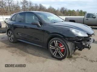 2013 Porsche Cayenne GTS с VIN WP1AD2A29DLA72323, выставлен на аукционе Copart как лот 52990885 с пробегом 100 812 миль миль и Списание • Salvage title. История ставок и продаж доступна на DreamBid. Изображение 4.