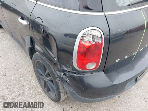 2015 MINI Countryman with VIN WMWZB3C53FWR43819, listed as a IAAI auction lot 41610007 with 134,185 mi miles and . Bid and sale history available at DreamBid. Image 6.