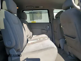 2015 Nissan Quest SV z VIN JN8AE2KP8F9127941, wystawiony jako Copart lot #61378405 z przebiegiem 184 944 mil mil oraz Czysty tytuł • Clean title. Historia ofert i sprzedaży dostępna na DreamBid. Obrazek 11.
