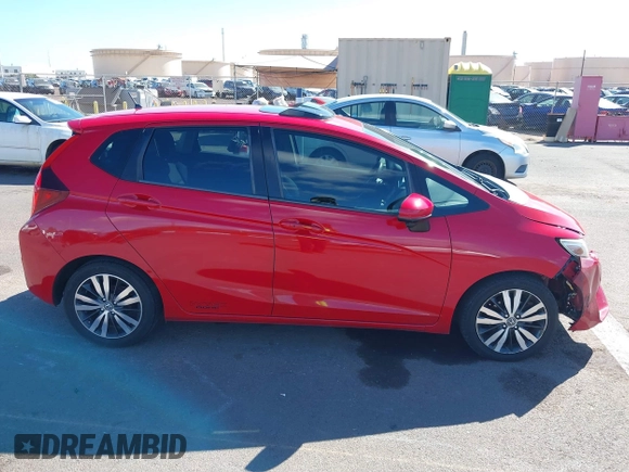 2015 Honda Fit EX-L z VIN 3HGGK5H84FM761279, wystawiony jako IAAI lot #40911141 z przebiegiem 82 217 mil mil oraz . Historia ofert i sprzedaży dostępna na DreamBid. Obrazek 14.