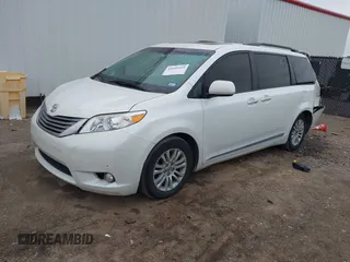 2016 Toyota Sienna XLE with VIN 5TDYK3DC2GS726677, listed as a IAAI auction lot 41609165 with 144,858 mi miles. Bid and sale history available at carsss.com. Image 2.