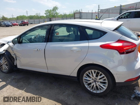 2016 Ford Focus Titanium with VIN 1FADP3N28GL222941, listed as a IAAI auction lot 42050881 with 97,001 mi miles and . Bid and sale history available at DreamBid. Image 14.