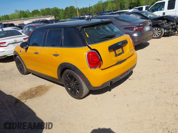2016 MINI Hardtop 4 Door with VIN WMWXU1C58G2D08712, listed as a IAAI auction lot 42038278 with 96,874 mi miles and . Bid and sale history available at DreamBid. Image 3.