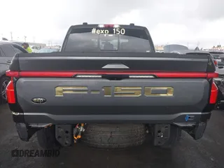 2022 Ford F-150 Lightning Pro z VIN 1FTVW1EL8NWG14070, wystawiony jako IAAI lot #41776980 z przebiegiem 14 812 mil mil oraz . Historia ofert i sprzedaży dostępna na DreamBid. Obrazek 17.