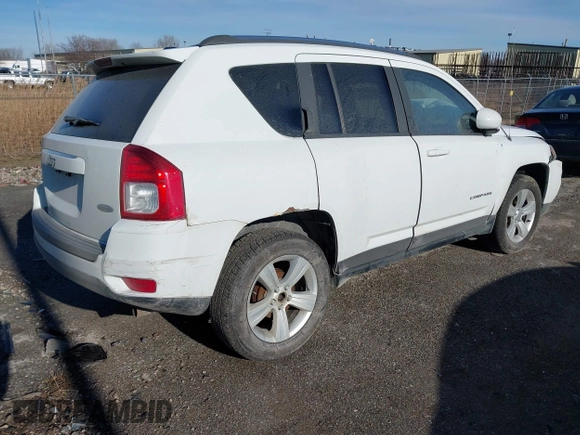2014 Jeep Compass Latitude with VIN 1C4NJCEB0ED660019, listed as a IAAI auction lot 41200065 with 185,174 mi miles. Bid and sale history available at carsss.com. Image 4.