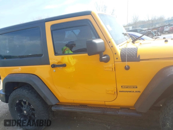 2012 Jeep Wrangler Sport with VIN 1C4AJWAG0CL128595, listed as a IAAI auction lot 42048590 with 133,085 mi miles and . Bid and sale history available at DreamBid. Image 13.