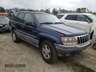 2002 Jeep Grand Cherokee z VIN 1J4GX38S42C229150, wystawiony jako Copart lot #72586834 z przebiegiem 201 103 mil mil oraz Szkoda całkowita • Salvage title. Historia ofert i sprzedaży dostępna na DreamBid. Obrazek 4.