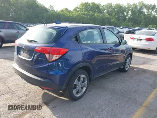 2017 Honda HR-V LX with VIN 3CZRU6H31HM703560, listed as a IAAI auction lot 42245963 with 125,818 mi miles and . Bid and sale history available at DreamBid. Image 4.