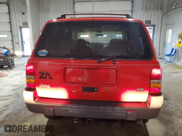 1997 Jeep Grand Cherokee Laredo with VIN 1J4GZ58Y5VC674687, listed as a Copart auction lot 43137095 with 173,228 mi miles and Salvage Title. Bid and sale history available at carsss.com. Image 6.