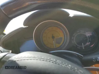 2014 Ferrari California z VIN ZFF65TJA2E0201735, wystawiony jako Copart lot #75178054 z przebiegiem Nie podano mil oraz Szkody całkowita. Historia ofert i sprzedaży dostępna na DreamBid. Obrazek 9.