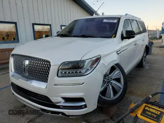 2018 Lincoln Navigator Reserve z VIN 5LMJJ3LT6JEL02379, wystawiony jako Copart lot #77600254 z przebiegiem 76 756 mil mil oraz Szkoda całkowita • Salvage title. Historia ofert i sprzedaży dostępna na DreamBid. Obrazek 1.