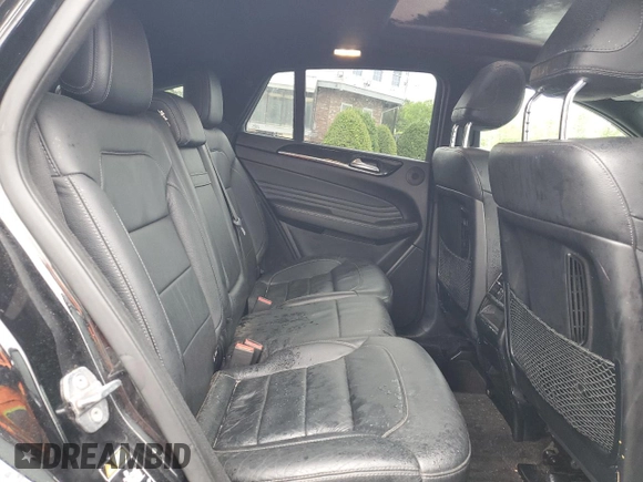 2019 Mercedes-Benz GLE 43 AMG with VIN 4JGED6EB5KA137564, listed as a Copart auction lot 57213595 with 104,144 mi miles and Salvage title. Bid and sale history available at DreamBid. Image 11.