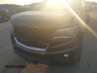 2016 Chevrolet Colorado 2WD LT z VIN 1GCGSCE37G1374901, wystawiony jako IAAI lot #41463562 z przebiegiem 163 716 mil mil oraz . Historia ofert i sprzedaży dostępna na DreamBid. Obrazek 6.