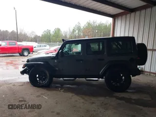 2020 Jeep Wrangler Unlimited Sport S z VIN 1C4HJXDG1LW103364, wystawiony jako IAAI lot #41541954 z przebiegiem 57 735 mil mil oraz . Historia ofert i sprzedaży dostępna na DreamBid. Obrazek 14.
